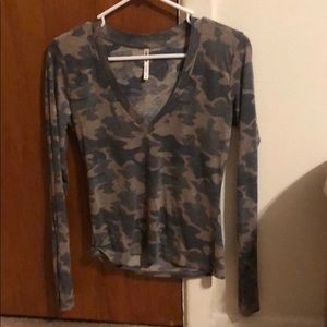 Camo v-neck long sleeve shirt.